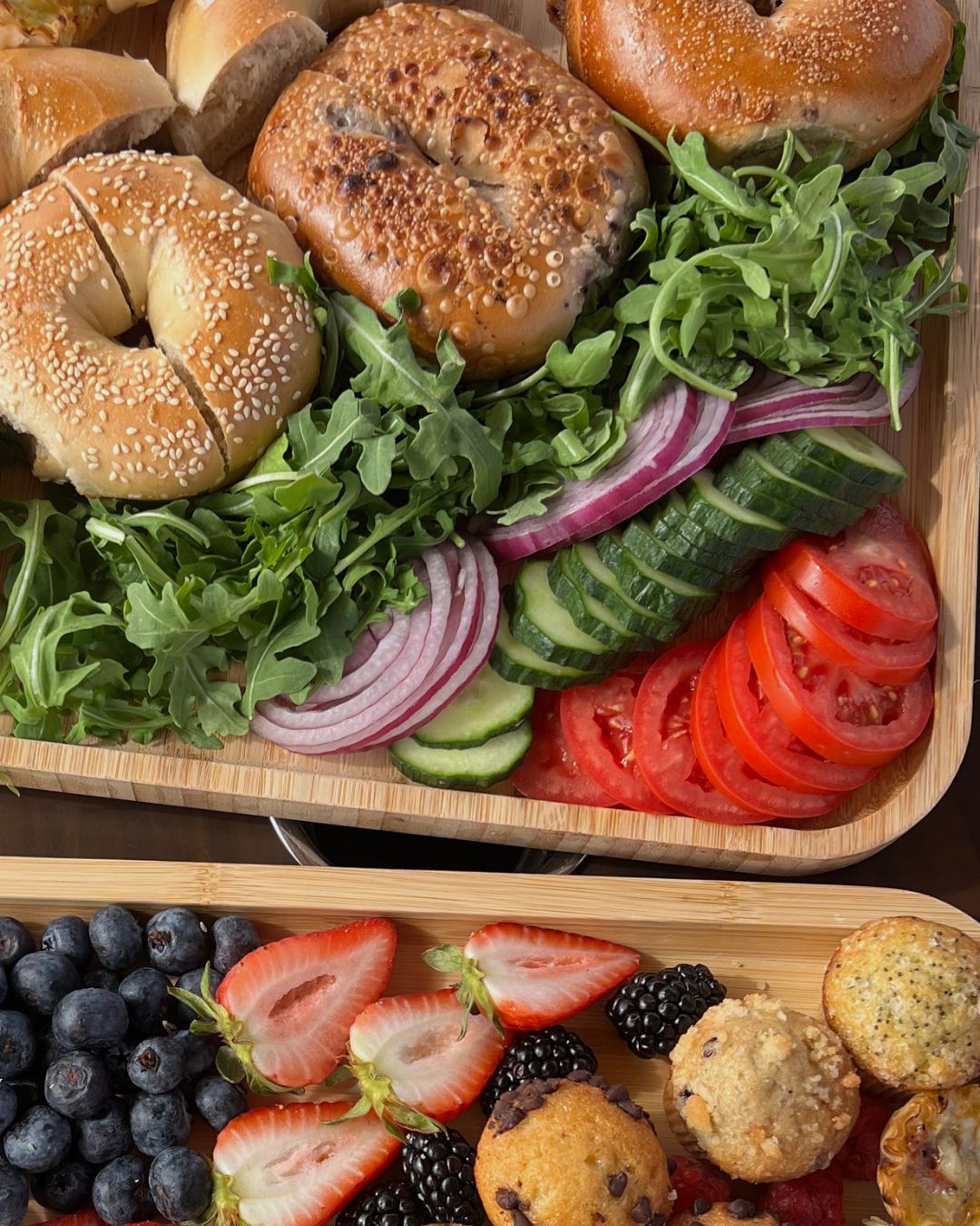 Sarandipity Fare brunch boards: bagels with arugula, red onion, cucumber and tomato, plus berries and mini muffins